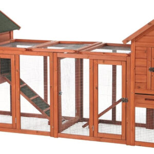 Two wooden chicken coops with green roofs.