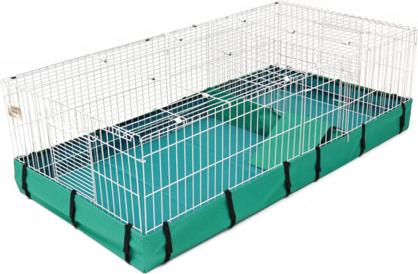 The MidWest Homes for Pets Guinea Habitat Plus Guinea Pig Cage by MidWest - Top Panel Included (47L x 24W x 14H Inches) with a green mat on top is perfect for your Guinea Pig.