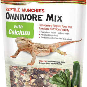 A close up of a container filled with Zilla Reptile Food Munchies Omnivore Mix with Calcium - Nutritious Food for Reptiles - 4-Ounce for reptiles.